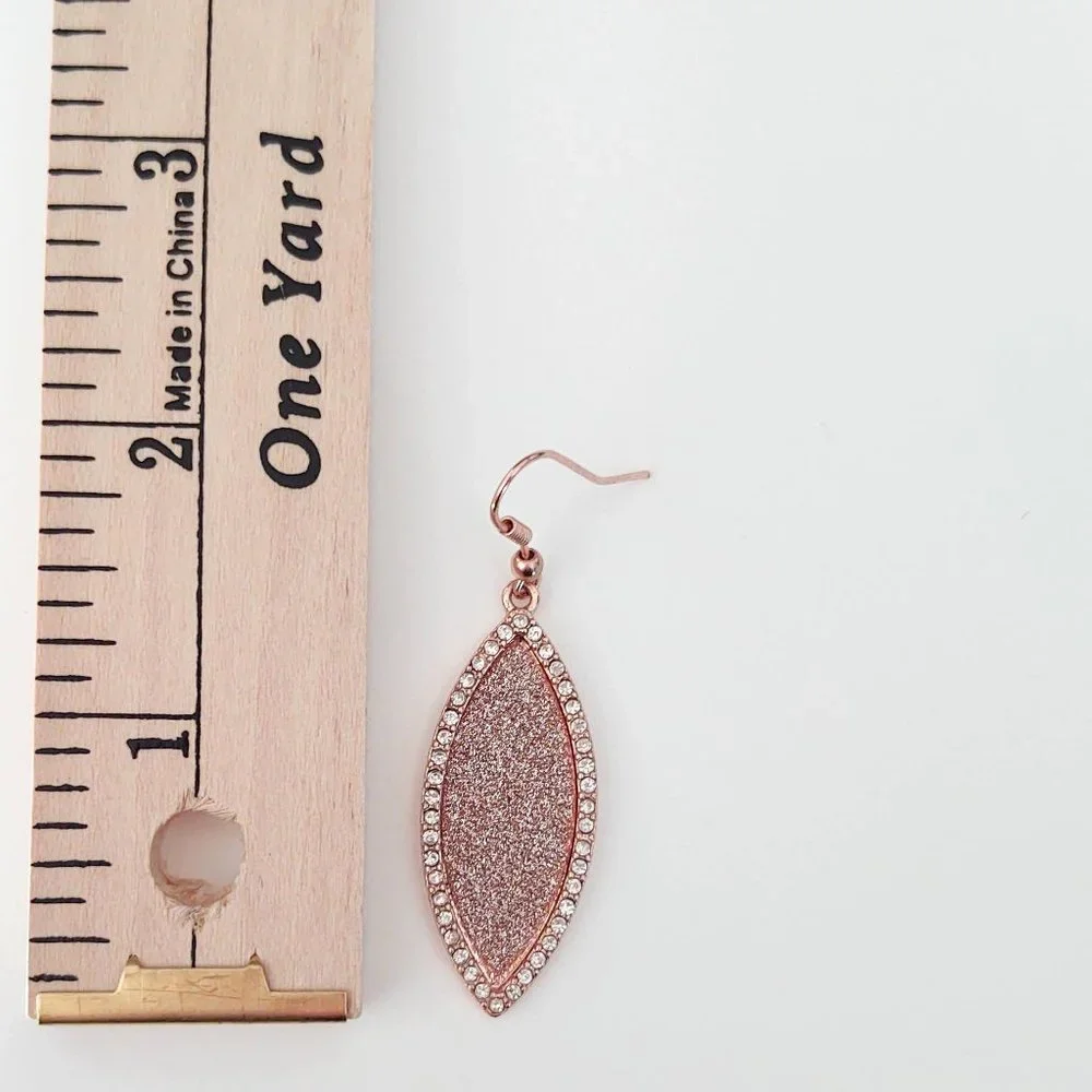 Sparkly rose gold dangle earrings with cz accents
